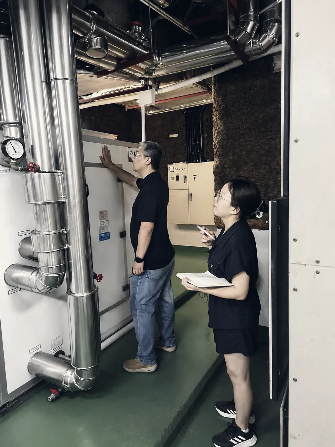 Engineer checking an air-handling unit